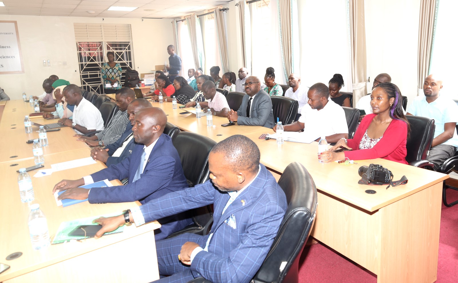 Prof. Umar Kakumba, Dr. Jude T. Mugarura and some of the members of staff from the School of Business witnessing the hand-over. Church of Jesus Christ of Latter-day Saints handed over 40 high-tech laptops and 10 projectors to Makerere University to facilitate teaching, learning, and research at the School of Business under the College of Business and Management Sciences (CoBAMS), 5th May 2025, Kampala Uganda, East Africa.