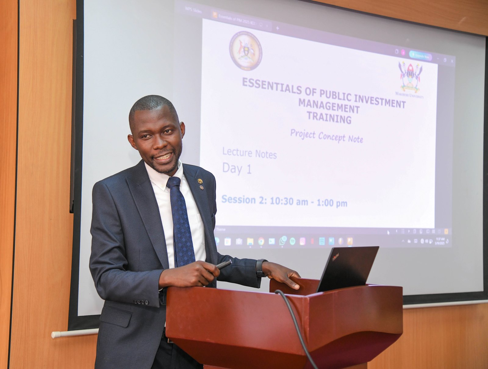 A facilitator addresses participants. Public Investment Management Centre of Excellence (PIM CoE), College of Business and Management Sciences (CoBAMS) launch of five-day training in the Essentials of Public Investment Management (PIM) for officials from the Kampala Capital City Authority (KCCA), 19th May 2025, CoBAMS Conference Hall, Makerere University, Uganda, East Africa.