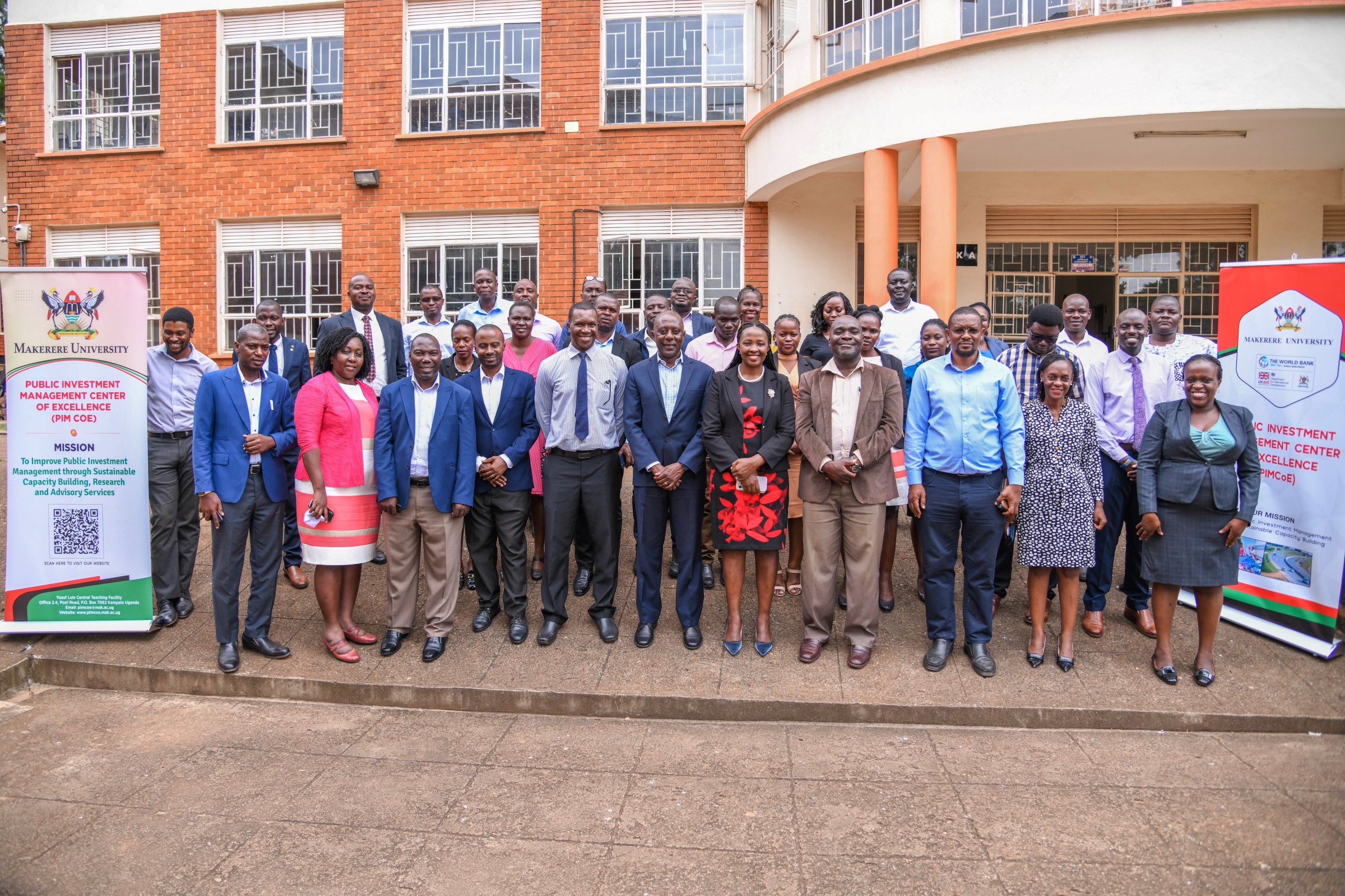 Participants pose for a group photo at the launch of the KCCA PIM Training. Public Investment Management Centre of Excellence (PIM CoE), College of Business and Management Sciences (CoBAMS) launch of five-day training in the Essentials of Public Investment Management (PIM) for officials from the Kampala Capital City Authority (KCCA), 19th May 2025, CoBAMS Conference Hall, Makerere University, Uganda, East Africa.
