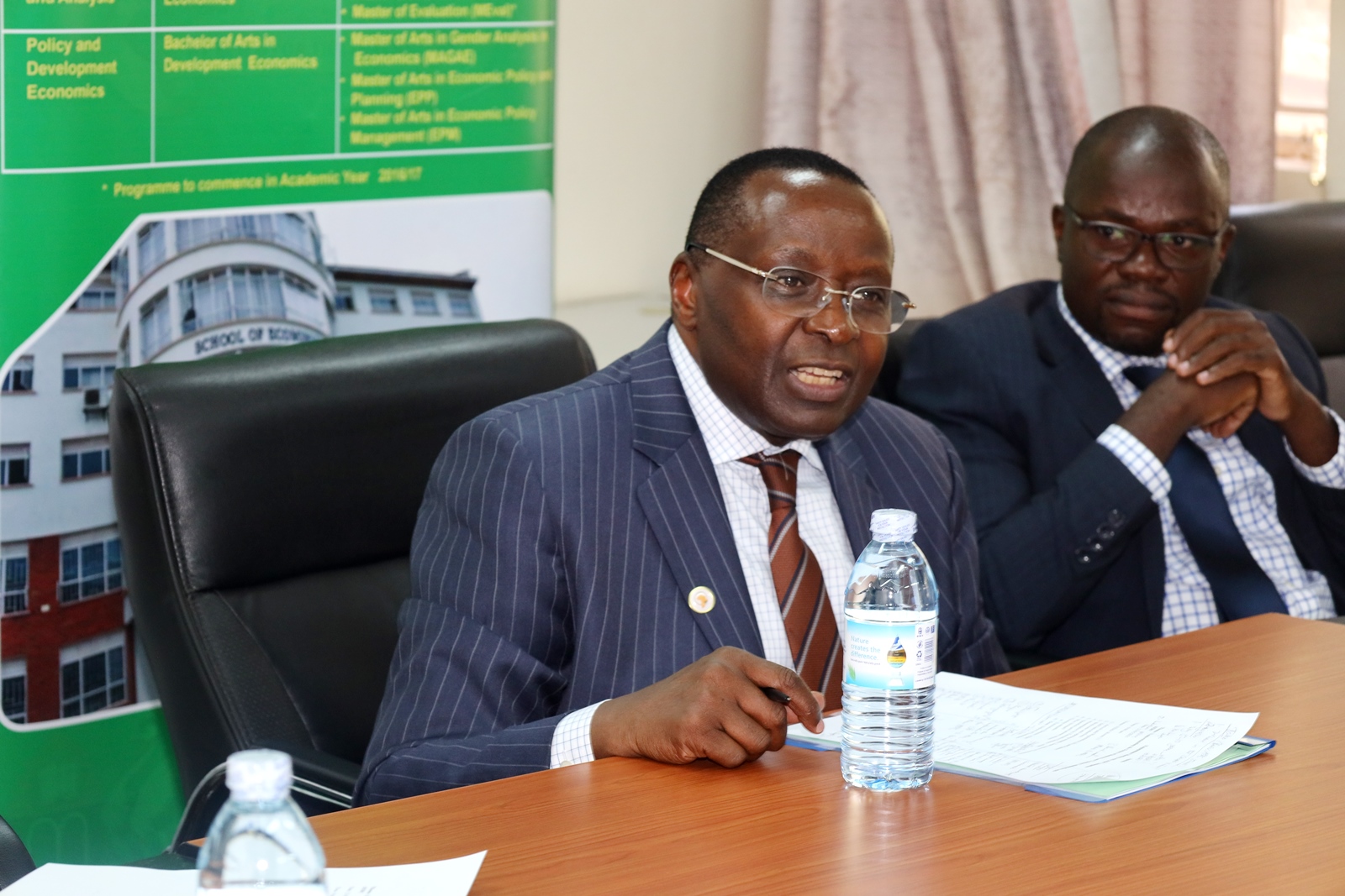 Prof. Victor Murinde, Executive Director of AERC (Left) and Prof. Ibrahim Mike Okumu, Dean, School of Economics (Right). Delegation from the African Economic Research Consortium (AERC) strengthening partnership with the School of Economics through re-engineering economic research, capacity building, policy formulation and collaboration to impact Africa’s development and transformation, College of Business and Management Sciences (CoBAMS), 23rd May 2025, Makerere University, Kampala Uganda.