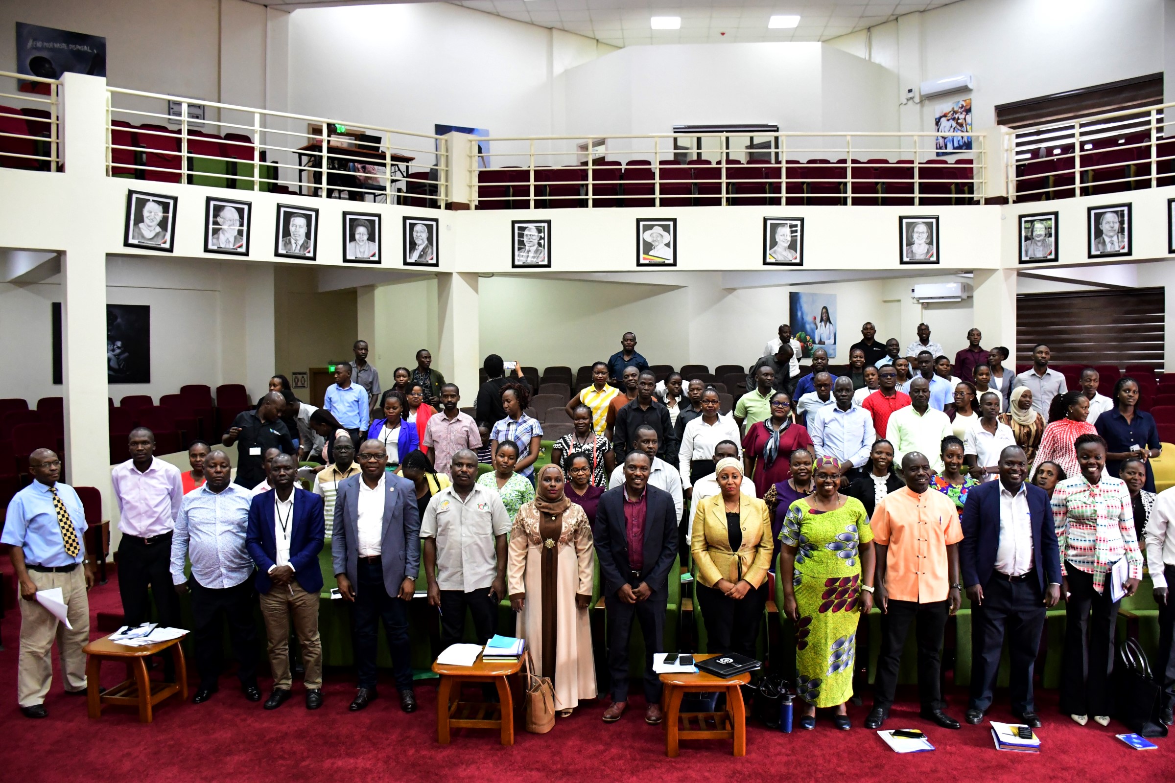 Participants pose for a group photo on Day Two of the staff induction ceremony. Makerere University day two of induction exercise spearheaded by the Directorate of Human Resources for newly appointed staff, whose tenures commenced in the 2024/2025 financial year, 16th May 2025, School of Public Health (MakSPH) Auditorium, Kampala Uganda, East Africa.