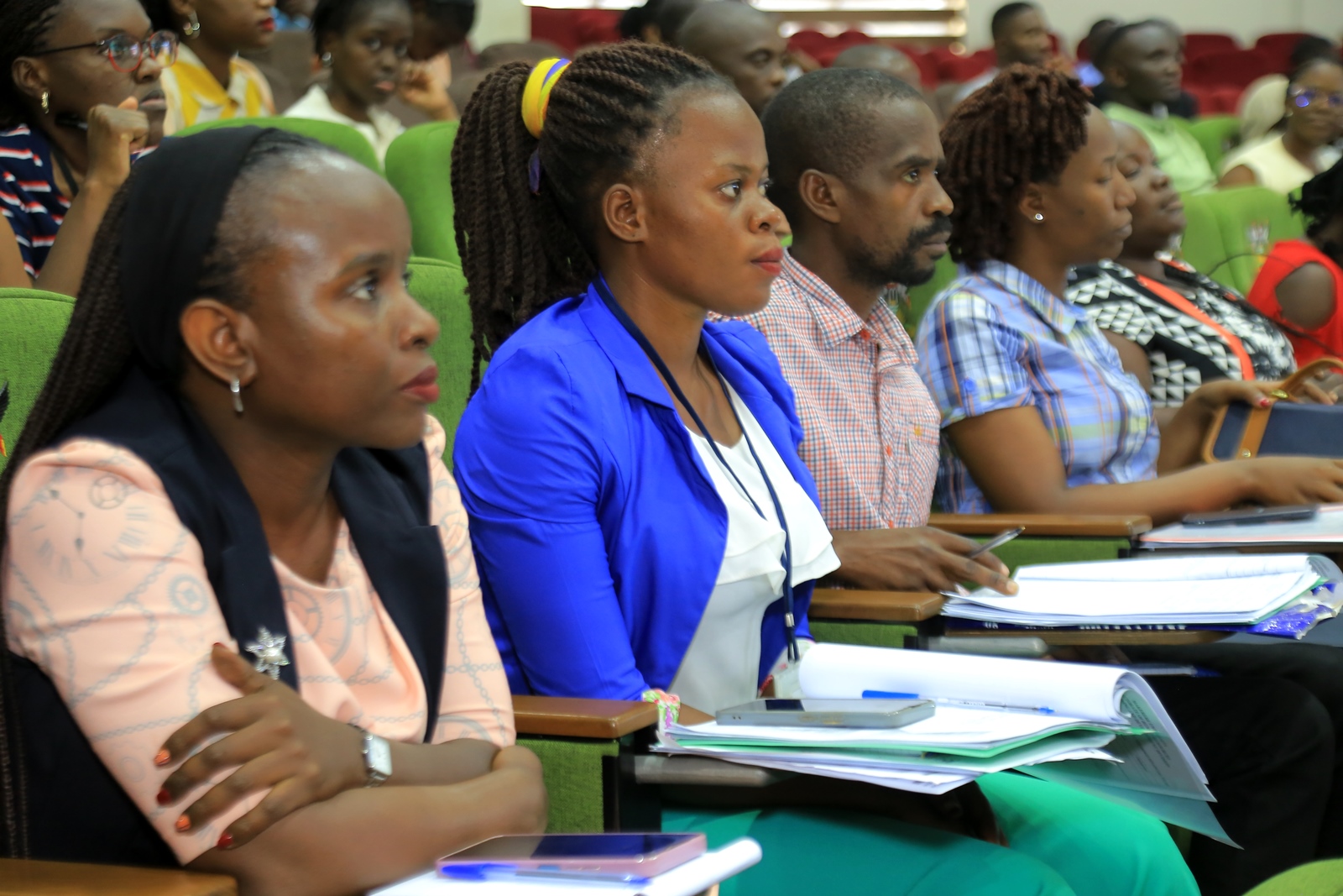 A section of newly appointed staff in the audience. Makerere University day two of induction exercise spearheaded by the Directorate of Human Resources for newly appointed staff, whose tenures commenced in the 2024/2025 financial year, 16th May 2025, School of Public Health (MakSPH) Auditorium, Kampala Uganda, East Africa.