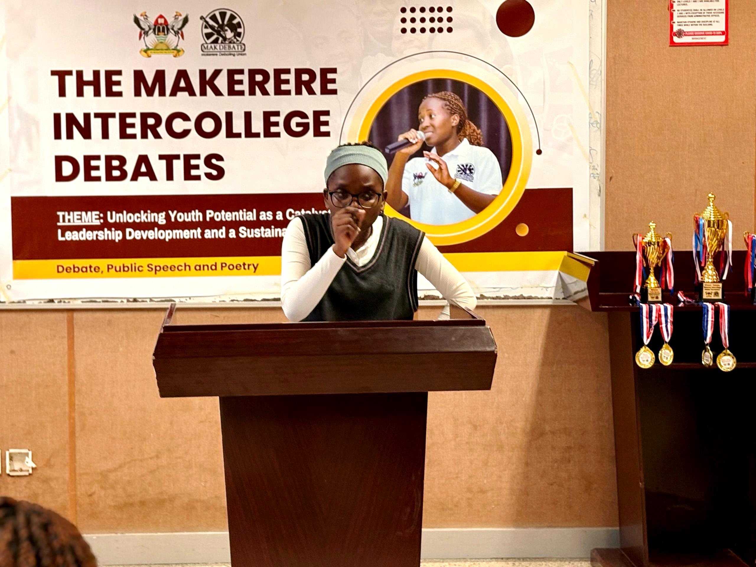 Daphine Kemigisha submitting at the debate grand finale. Organised by the Makerere Debating Union – a student-led initiative, the Inter-college Debate Tournament was held on 11th and 12th April 2025 with a vision to leave no student behind by nurturing a community of confident, articulate, and visionary leaders who will drive positive change in society. Makerere University, Kampala Uganda, East Africa.