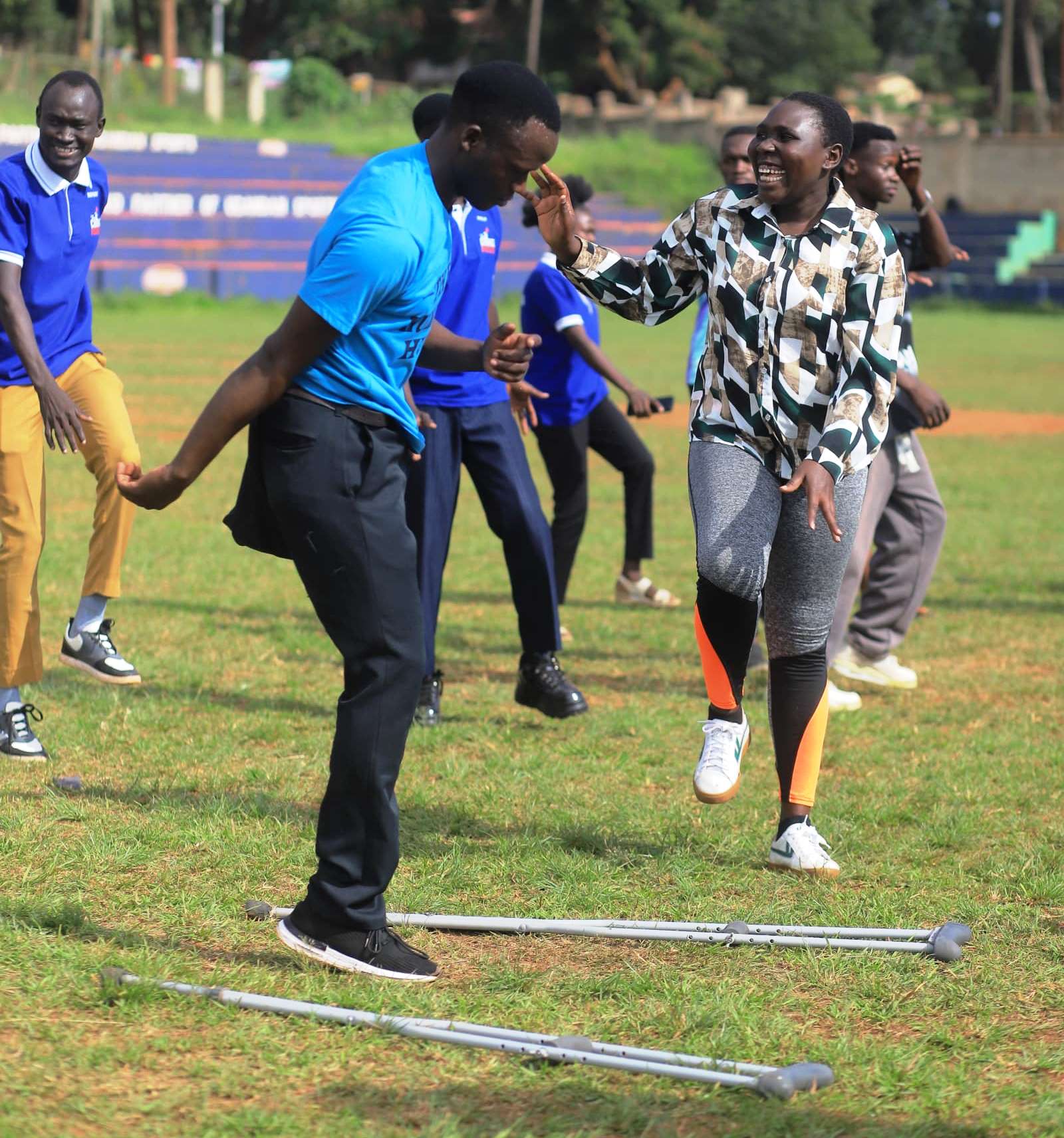 Participants engage in aerobics. Mastercard Foundation Scholars Program family day event, 19th May 2025, Rugby Grounds, Makerere University, Kampala Uganda, East Africa.
