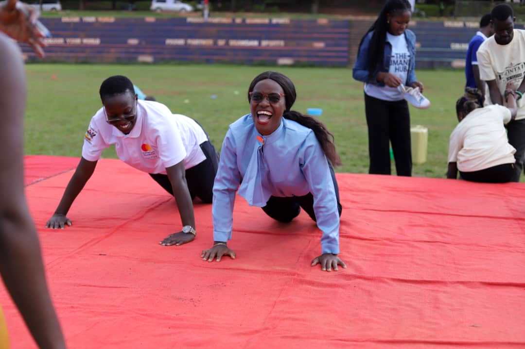 Female participants engage in one of the challenges. Mastercard Foundation Scholars Program family day event, 19th May 2025, Rugby Grounds, Makerere University, Kampala Uganda, East Africa.