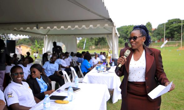 Prof. Justine Namaalwa addresses Scholars during the family day event on 19th May 2025. Mastercard Foundation Scholars Program family day event, 19th May 2025, Rugby Grounds, Makerere University, Kampala Uganda, East Africa.