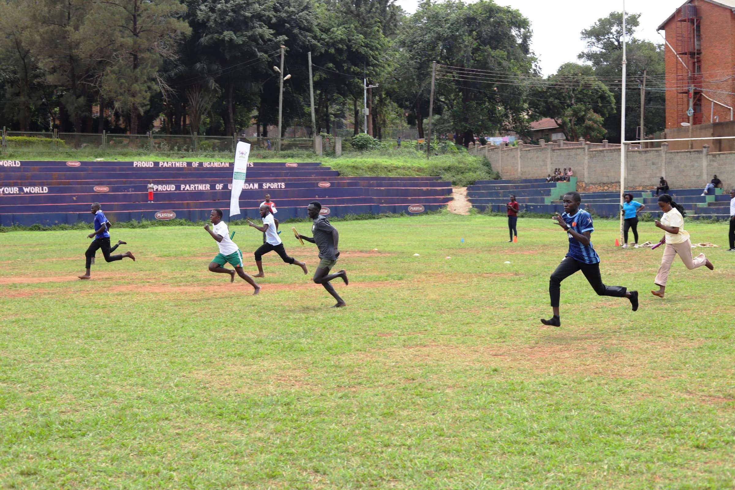 Scholars running during the fun and games. Mastercard Foundation Scholars Program family day event, 19th May 2025, Rugby Grounds, Makerere University, Kampala Uganda, East Africa.