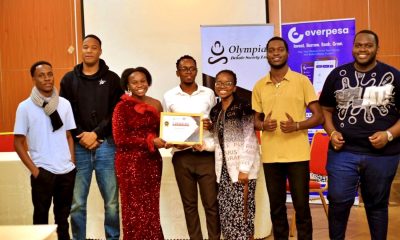 Makerere University team receiving their Certificate of Participation. Olympia Debate Society, Nairobi Kenya, East Africa.