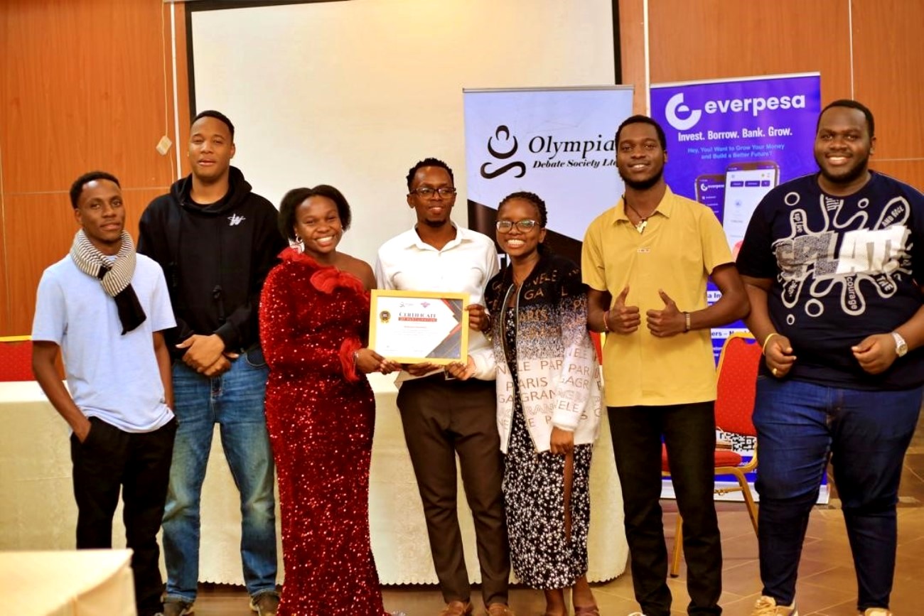Makerere University team receiving their Certificate of Participation. Olympia Debate Society, Nairobi Kenya, East Africa.