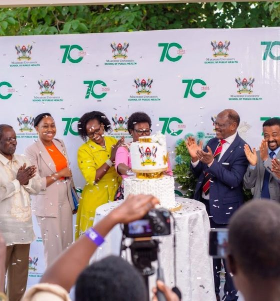 Partners from the Ministry of Health, WHO, and Makerere University leadership, including Council Chairperson Ms. Lorna Magara, Vice Chancellor Prof. Barnabas Nawangwe, and Dean Prof. Rhoda Wanyenze, join the Minister of Health in cutting the MakSPH@70 anniversary cake. 13th December 2024, MakSPH Auditorium, Makerere University, Kampala Uganda, East Africa.