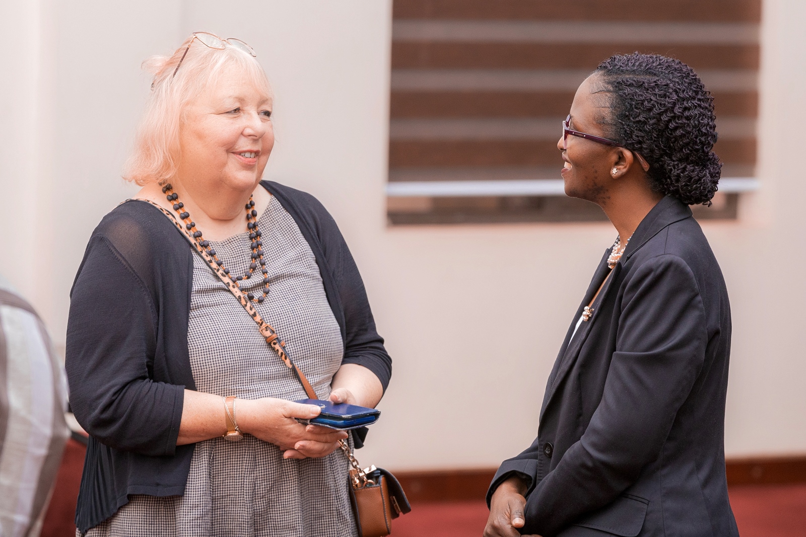 Dr. Sheba Gitta (right) sharing with Prof. Linda Gibson during the dissemination workshop on April 23, 2025. Makerere University School of Public Health (MakSPH) disseminating outcomes of a major leadership and management strengthening initiative in Wakiso District, Central Uganda. The one-year project, part of the Global Health Partnerships programme funded by NHS England implemented in collaboration with Nottingham Trent University, Nottingham University Hospitals NHS Trust, Wakiso District Local Government, and Uganda’s Ministry of Health, 23rd April 2025, MakSPH Auditorium, Kampala, East Africa.
