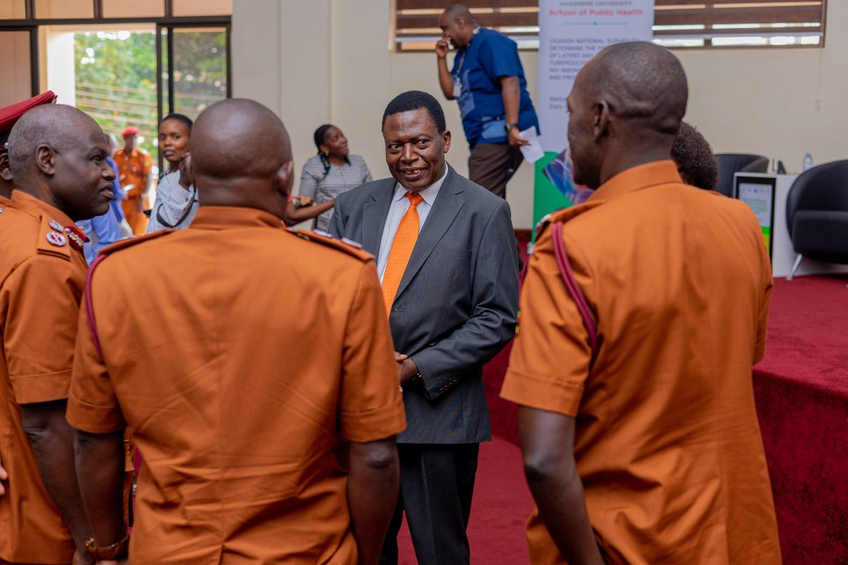 Dr. Charles Olaro, Director General of Health Services at the Ministry of Health interacts with officers of the Uganda Prisons Service, at the MakSPH Auditorium on Thursday. Release of findings of Uganda National Prevalence Survey on Tuberculosis, HIV, and COVID-19 conducted by Makerere University School of Public Health (MakSPH) in conjunction with the Uganda Prisons Services (UPS) and the Ministry of Health—with funding from the U.S. President’s Emergency Plan for AIDS Relief (PEPFAR) and technical support from the U.S. Centers for Disease Control and prevention (CDC), 15th May 2025, MakSPH Auditorium, Makerere University, Kampala Uganda, East Africa.