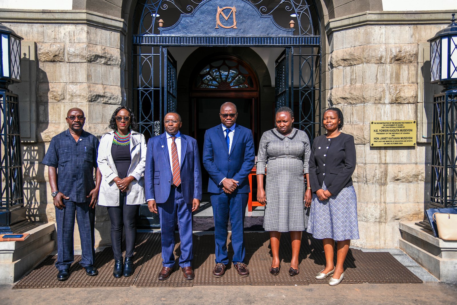 Prof. Ibrahim Mike Okumu and Ms. Betty Kyakuwa with the delegation at the Main Building entrance. Delegation from the African Economic Research Consortium (AERC) courtesy call on the Vice Chancellor, received by Prof. Tonny Oyana, 23rd May 2025, Makerere University, Kampala Uganda.