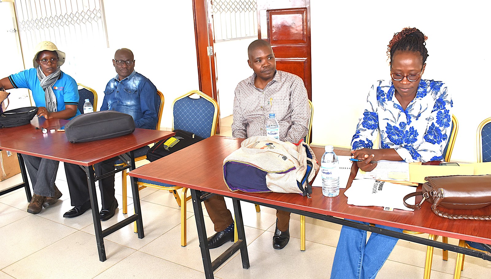 The project team members attending a training session at Rwebitaba Tea Research Centre. From Right to left: Dr. Prossy Nakawuka, Dr. Alex Nimusiima - Team Leader, Makerere University, Dr. Twaha Ali Basamba, and Dr. Grace Nakabonge. Nature-based Solutions for Tea (NbS4Tea) project at College of Agricultural and Environmental Sciences (CAES), Makerere University, Kampala, Funded by the Danish Fellowship Centre under Denmark’s Ministry of Foreign Affairs, deployment of drones to improve environmental and agricultural data collection at Rwebitaba Tea Research Centre in Kyenjojo District, Uganda, East Africa, 19th June 2025.