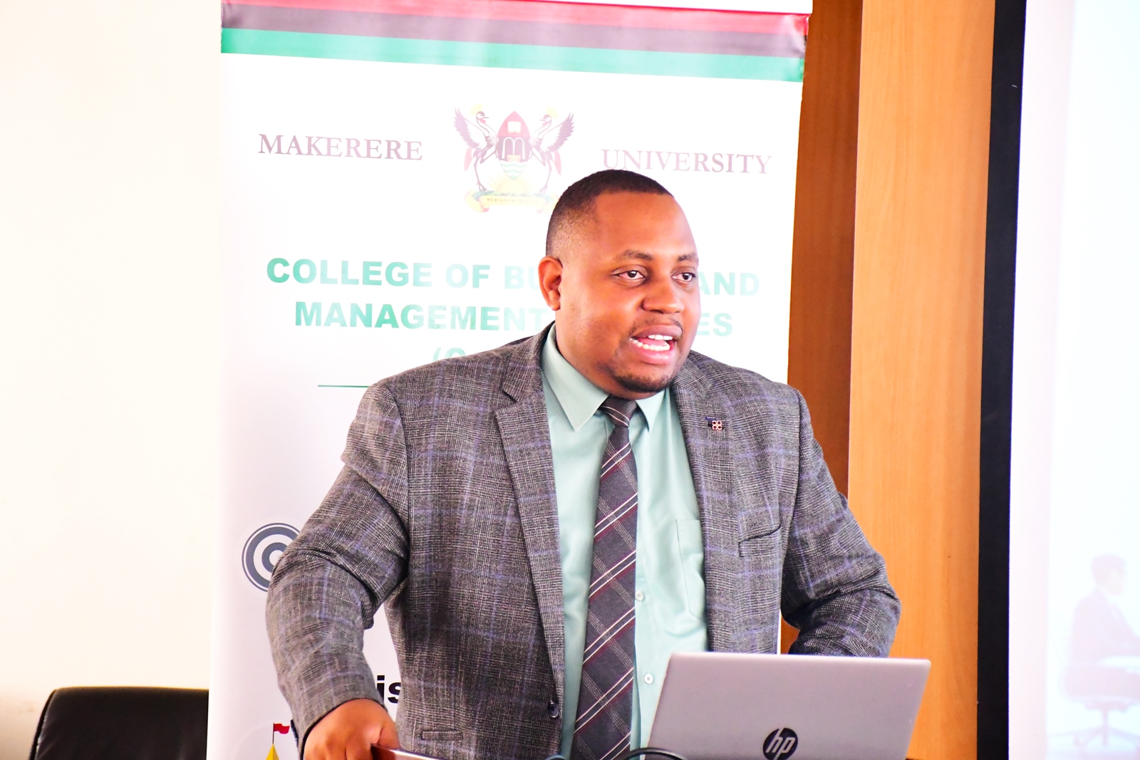 Mr. Mordecai Tayebwa. Training workshop aimed at empowering staff with knowledge and techniques on grants administration and management, facilitated by Grants Administration and Management Support Unit (GAMSU), 4th June 2025, College of Business and Management Sciences (CoBAMS) Conference Room, Makerere University, Kampala Uganda, East Africa.