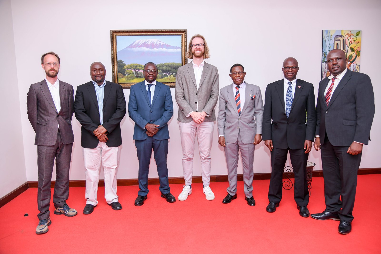 Prof. Buyinza Mukadasi (3rd R) with R-L: Dr. John Mushomi, Associate Prof. James Wokadala, Prof. Muller Gustavo, Associate Prof. Ibrahim Mike Okumu and other officials during the courtesy call. Network on Europe and Africa Relations-Education and Research (NEAR-ER) project, a Jean Monnet policy network of 20 higher education institutions; 7 in Europe and 13 in Africa, Dialogue targeting early career researchers and graduate students organized by School of Statistics, College of Business and Management Sciences (CoBAMS), 16th June 2025, Main Hall, Makerere University, Kampala Uganda, East Africa.