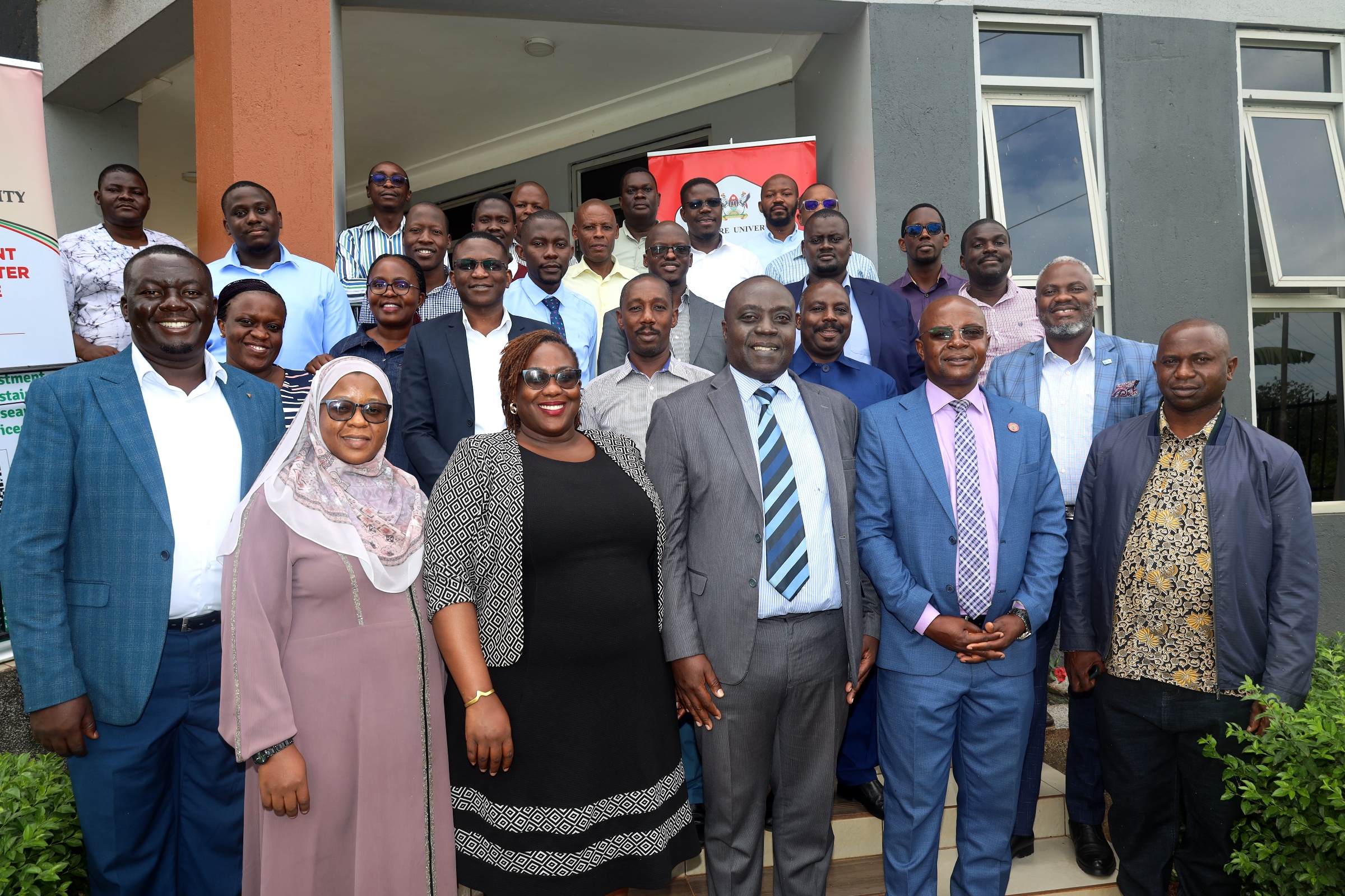 Mr. Paul Mwanja and Prof. Edward Bbaale pose for a group photo with participants at the IRCBA Training commencement on 30th June 2025 in Jinja. Ministry of Finance, Planning and Economic Development (MoFPED), Public Investment Management Centre of Excellence at Makerere University, two-week Integrated Regulatory Cost-Benefit Analysis (IRCBA) training commencement 30th June to 11th July 2025, Jinja Uganda, East Africa.