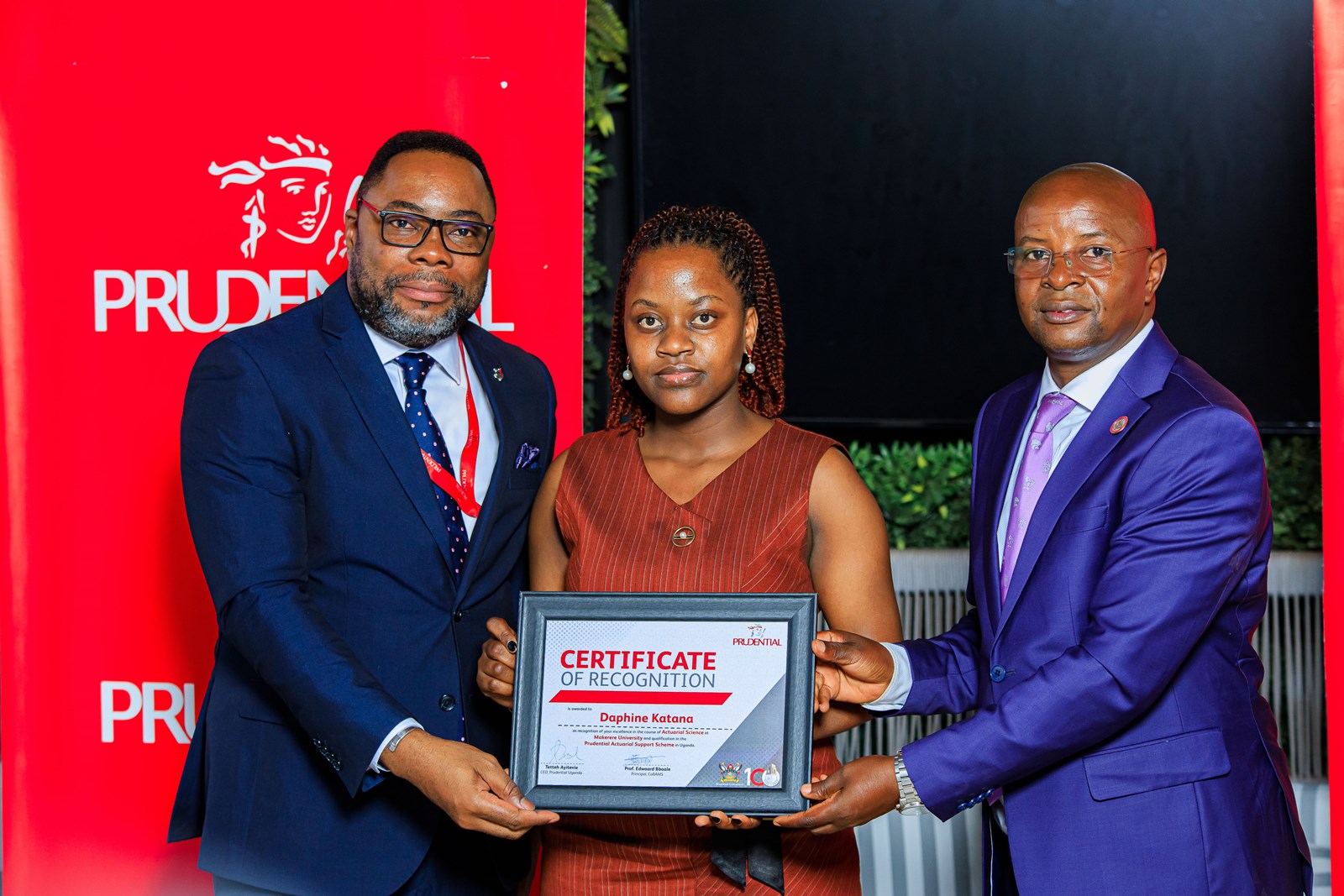 L-R: Mr. Tetteh Ayitevie – Chief Executive Officer of Prudential Uganda, Ms. Daphine Katana - Exceptional Graduate Award Recipient, and Prof. Edward Bbaale – Principal of Makerere University College of Business and Management Sciences (CoBAMS). Prudential Uganda award of UGX 135 million to the top five graduates of Makerere University’s Actuarial Science program, under the Prudential Actuarial Support Scheme (PASS), demonstrating its firm commitment to nurturing globally competitive actuarial talent within the country, 11th June 2025, Kampala Uganda, East Africa.