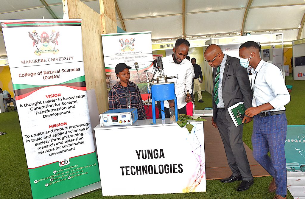 Team Leader Bill Garvin with team members Kalanguka Patience Pearl and Nuwagaba Victor showcase their project – converting invasive water hyacinth into sustainable biofuels through hydrothermal liquefaction. Over 300 Ugandan innovators, among them students from the College of Natural Sciences (CoNAS) and other science-based colleges at Makerere University are participating in the 2025 National Science Week exhibition, currently underway at the Kololo Independence Grounds, 15th-20th June 2025, Kampala Uganda, East Africa.