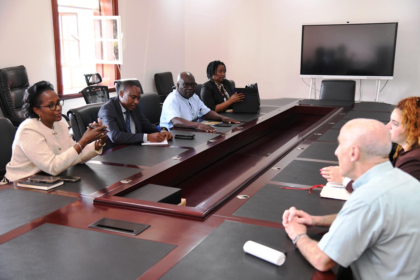 Mrs. Lorna Magara makes her remarks at the meeting. The Ambassador of Israel in Nairobi accredited to Kenya, Uganda, Malawi, Tanzania and the Seychelles, H.E. Michael Lotem farewell visit to Makerere University, Kampala Uganda, East Africa on 11th June 2025.