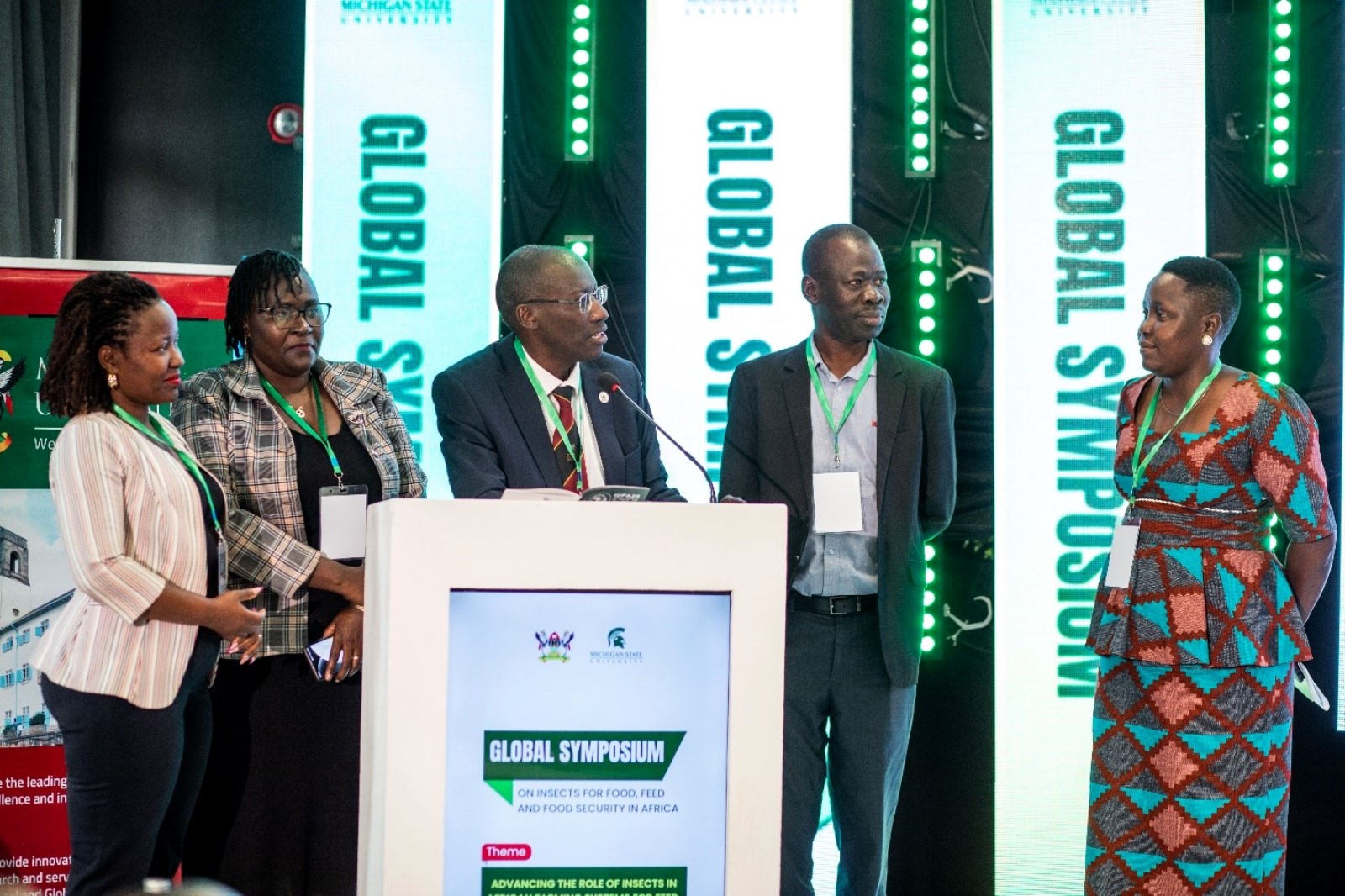 (L_R) Dr. Dorothy Nampanzira, HOD LIR, Dr. Claire M. Mugasa, DEAN SBLS, Prof. Frank Norbert Mwiine, Principal CoVAB, Assoc. Prof. James Acai Okwee, Deputy Principal CoVAB, and the host, Dr. Amulen Deborah Ruth, at the opening of the symposium on 5th June 2025, at Onomo Hotel in Kampala. Symposium exploring the role of insects in African farming systems convened by Makerere University’s College of Veterinary Medicine, Animal Resources and Biosecurity (CoVAB) in collaboration with Michigan State University (MSU) 5th-6th June, 2025, Onomo Hotel, Kampala Uganda, East Africa.
