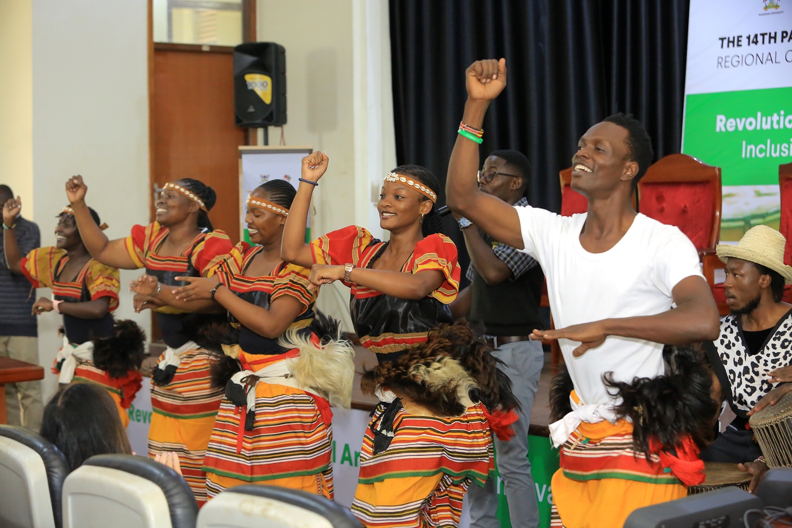 Dancers entertain conference participants during one of the music intervals. 14th Pan-African Society for Music Arts Education (PASMAE) in partnership with the International Society for Music Education (ISME) Regional Conference bringing on board educators, researchers, performers, students, cultural practitioners, and policymakers from across the globe to revolutionize African musical arts education, Opening Ceremony, 1st July 2025, School of Food Technology, Nutrition and Bio-engineering Conference Hall, Makerere University, Kampala Uganda, East Africa.