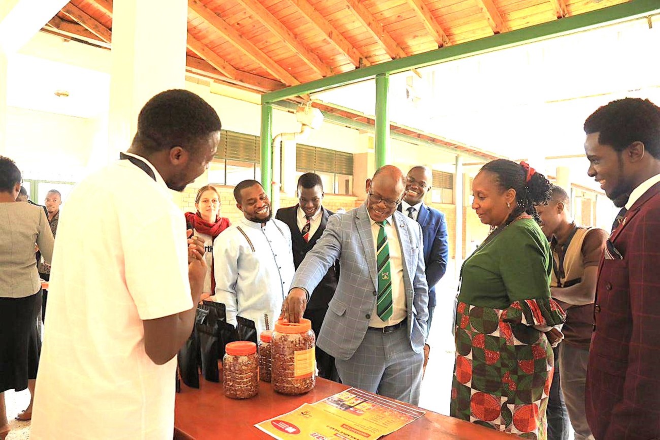 The Vice Chancellor engaging with participants who showcased some of the products from the Centre. Launch of the revitalization programme for the Food Technology and Business Incubation Centre (FTBIC), School of Food Technology, Nutrition and Bioengineering (SFTNB), College of the Agricultural and Environmental Sciences (CAES) , Makerere University by Prof. Barnabas Nawangwe, 10th July 2025, Kampala Uganda, East Africa.