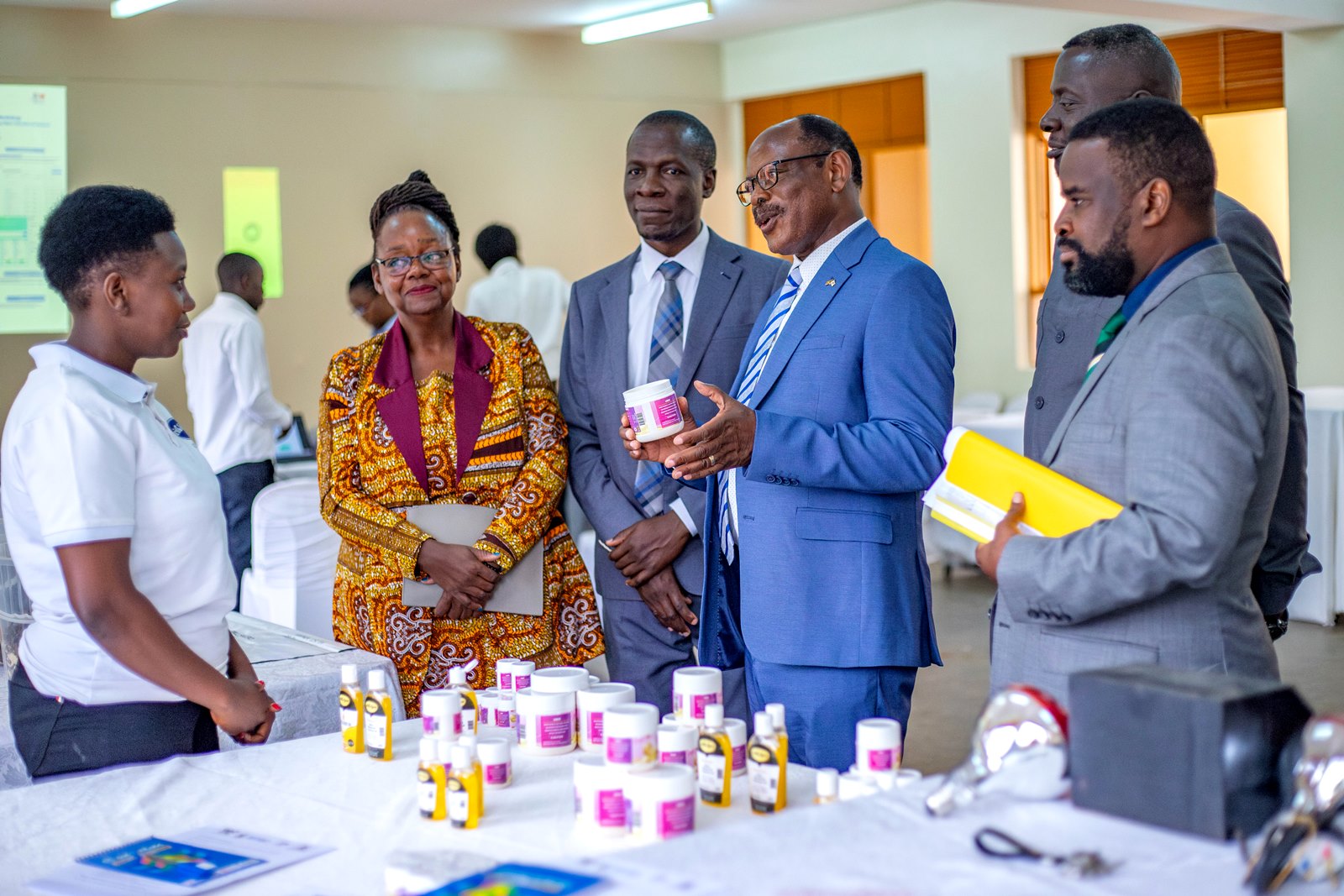 A tour of exhibitions-Left to Right: MUST Student-Raphaelina Okoth, Prof. Dorothy Okello, Dr. Abubaker Waswa, Prof. Barnabas Nawangwe, Mr. Timothy Ssejjoba and Prof. Robert Wamala. People's Republic of China funding to United Nations Educational, Scientific and Cultural Organization (UNESCO) to undertake China Funds In Trust (CFIT) project, CFIT III National Workshop, 29th July 2025, College of Engineering, Design, Art and Technology (CEDAT) Conference Hall, Makerere University, Kampala Uganda, East Africa.