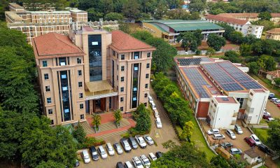 An elevated shot of the IDI-McKinnell Knowledge Centre (Left) and the Department of Pharmacy Building (Right) with the array of solar panels. Vice Chancellor, Prof. Barnabas Nawangwe inaugurated the Infectious Diseases Institute (IDI) at Makerere University's ground-breaking 384kWp solar-powered electricity grid, Africa’s largest campus-based solar system, July 24, 2024, Kampala Uganda, East Africa.