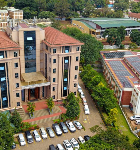 An elevated shot of the IDI-McKinnell Knowledge Centre (Left) and the Department of Pharmacy Building (Right) with the array of solar panels. Vice Chancellor, Prof. Barnabas Nawangwe inaugurated the Infectious Diseases Institute (IDI) at Makerere University's ground-breaking 384kWp solar-powered electricity grid, Africa’s largest campus-based solar system, July 24, 2024, Kampala Uganda, East Africa.