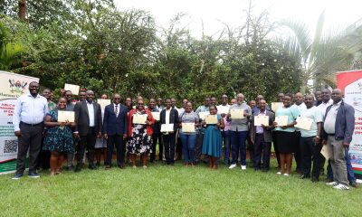 Commissioner Paul Mwanja and Assoc. Prof. Ibrahim Mike Okumu pose for a photo with participants after the certificate award ceremony on 11th July 2025. Public Investment Management (PIM) Centre of Excellence at Makerere University College of Business and Management Sciences (CoBAMS) conclusion of two-week training on the Certificate of Financial Implications (CFI) – Integrated Regulatory Cost-Benefit Analysis, for 34 economists from various MDAs with critical policy evaluation and fiscal analysis skills, 11th July 2025, Pearl on the Nile Hotel, Jinja Uganda, East Africa.