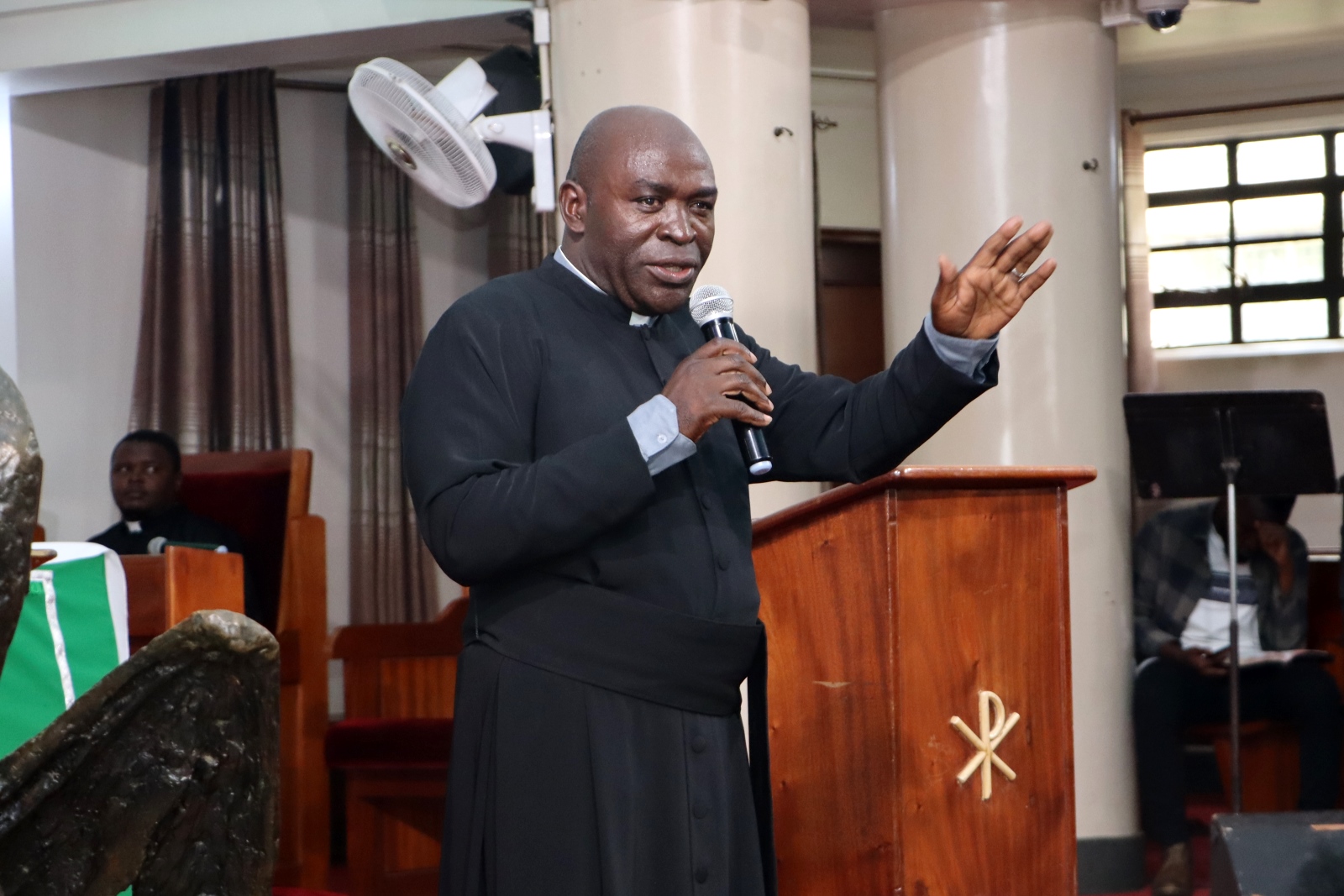 Rev. Musa Baluku Syamutsangira preaches the day's message. Funeral Service in honour Mr. Besweri Wandera, Assistant Lecturer, Department of Sports Science, College of Natural Sciences (CoNAS), 24th July 2025, St. Francis Chapel, Makerere University, Kampala Uganda, East Africa.