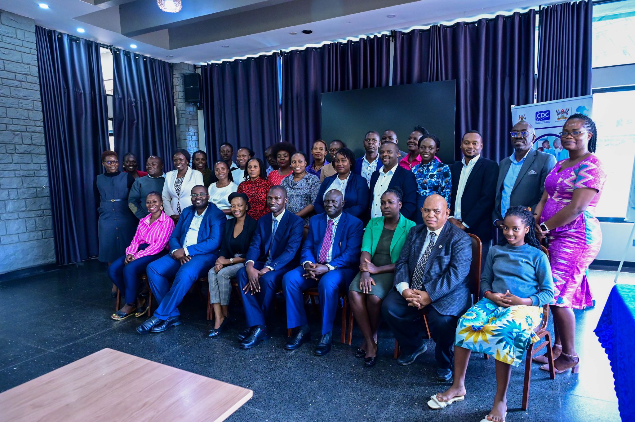 Participants pose for a group photo during the dissemination of 7-1-7 research, which illustrates how this framework has strengthened Uganda’s outbreak response. Photo: Infectious Diseases Institute, Makerere University. Kampala Uganda, East Africa.