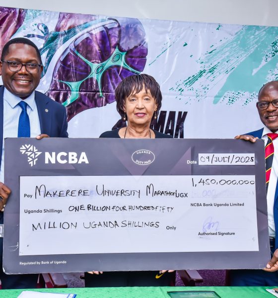 Left to Right: NCBA Bank CEO-Mr. Mark Muyobo, MakEF Board Chairperson-Dr. Maggie Kigozi and the Vice Chancellor-Prof. Barnabas Nawangwe hold the dummy cheque unveiling the UGX 1.45 billion sponsorship for the Makerere Marathon for the next five years. Makerere University Endowment Fund (MakEF)’s flagship initiative – the Makerere University Marathon unveiling of NCBA Bank Uganda as Platinum Sponsor with UGX 1.45 Billion over five years, 9th July 2025, Kampala, East Africa.