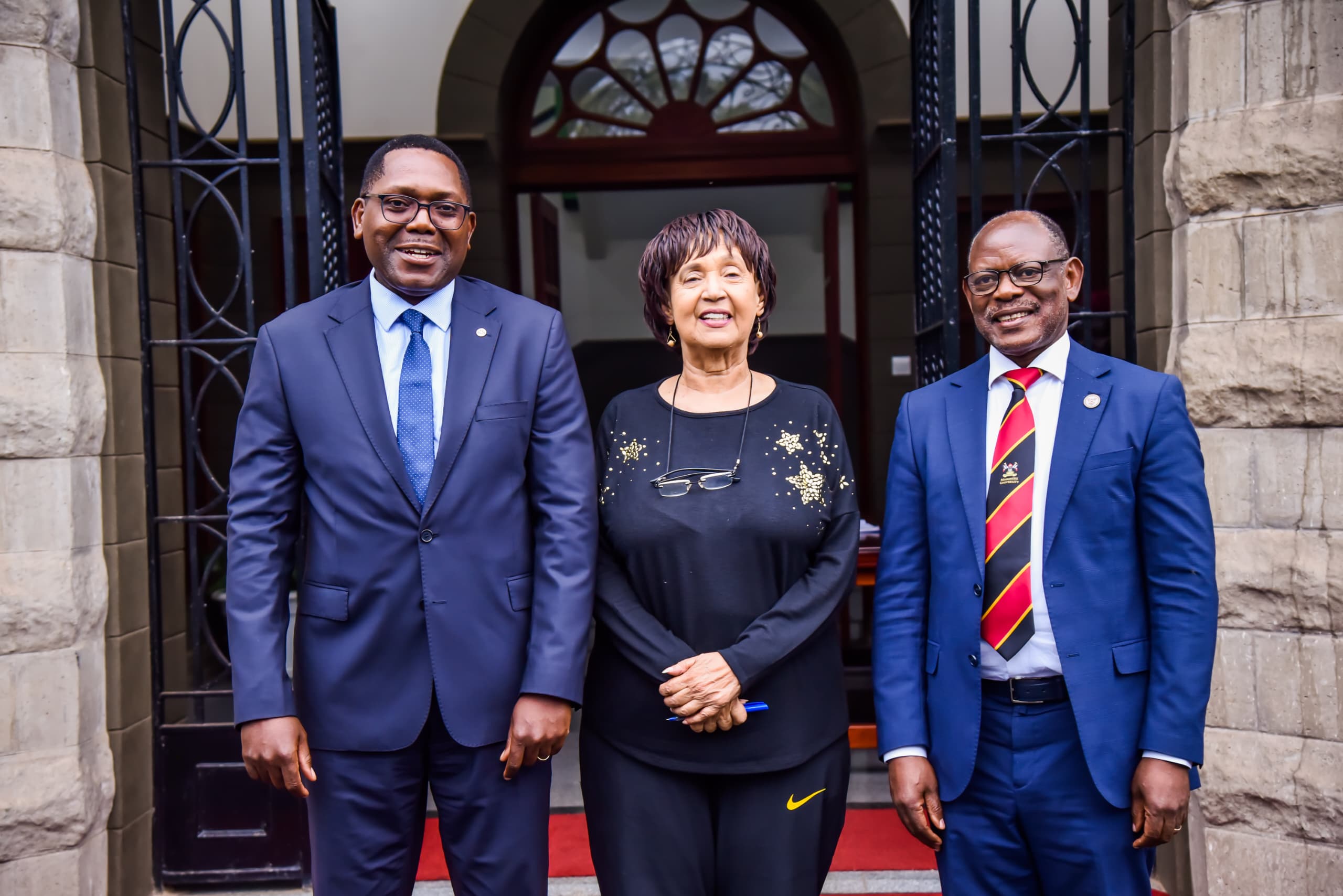 Left to Right: Mr. Mark Muyobo, Dr. Maggie Kigozi and Prof. Barnabas Nawangwe pose for a photo at the Main Building entrance. Makerere University Endowment Fund (MakEF)’s flagship initiative – the Makerere University Marathon unveiling of NCBA Bank Uganda as Platinum Sponsor with UGX 1.45 Billion over five years, 9th July 2025, Kampala, East Africa.