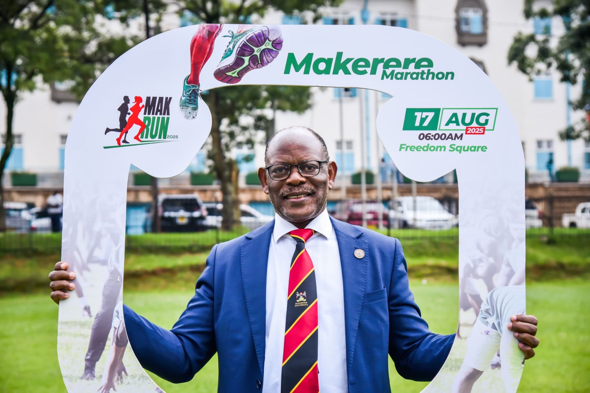 Prof. Barnabas Nawangwe poses with the #MakRun2025 photo frame. Makerere University Endowment Fund (MakEF)’s flagship initiative – the Makerere University Marathon unveiling of NCBA Bank Uganda as Platinum Sponsor with UGX 1.45 Billion over five years, 9th July 2025, Kampala, East Africa.