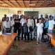 Mr. Henry Nsubuga, Mr. Peter Mwanja, Dr. Gardner Herbert and other officials pose with International Students at a Mental Health Awareness Drive