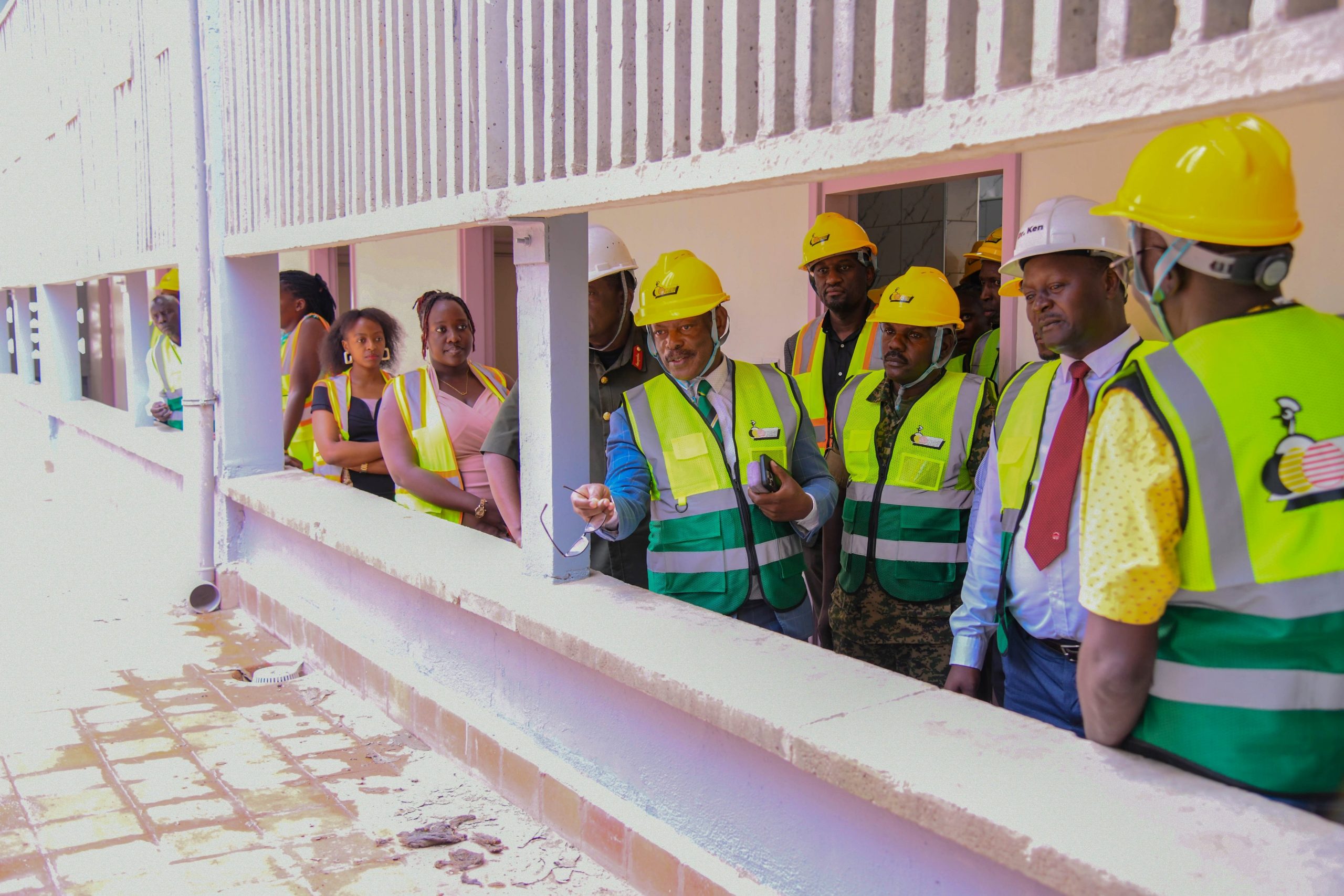 Dr. Kenneth Ssemwogere (White Hard Hat) leads the Vice Chancellor and other officials on a guided tour of the renovated Mary Stuart Hall. The National Enterprise Corporation (NEC) hands over fully refurbished Mary Stuart Hall. The renovation, which cost UGX 10.5 billion, began on 26th July 2024 and was completed exactly a year later, on 25th July 2025. Makerere University, Kampala Uganda, East Africa.