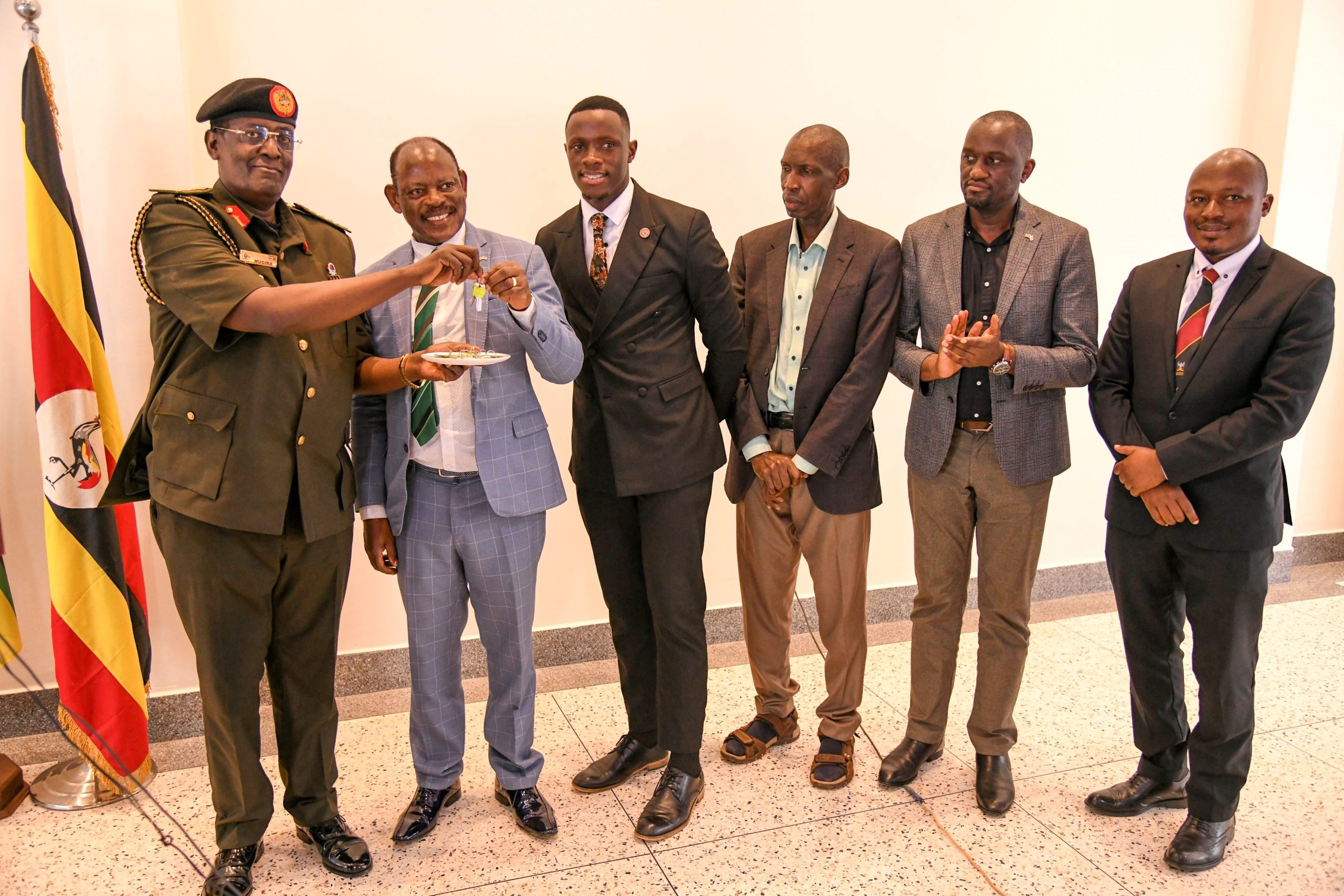 Left to Right: MD and CEO NEC-Lt. Gen. James Mugira conducts a symbolic handover of keys to the Vice Chancellor-Prof. Barnabas Nawangwe as 91st Guild President-H.E. Ssentamu Churchill James, Principal CEES and Ag. DVCFA-Prof. Anthony Muwagga Mugagga, Deputy University Secretary-Mr. Simon Kizito and Deputy Dean of Students-Dr. Rodney Rugyema witness on 25th July 2025. The National Enterprise Corporation (NEC) hands over fully refurbished Mary Stuart Hall. The renovation, which cost UGX 10.5 billion, began on 26th July 2024 and was completed exactly a year later, on 25th July 2025. Makerere University, Kampala Uganda, East Africa.