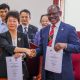 Prof. Barnabas Nawangwe (Right) and Prof. Zhu Yan (Left) shake hands as they display the signed MoU on 28th July 2025. Vice Chancellor, Prof. Barnabas Nawangwe signs MoU with Nanjing Agricultural University (NAU), China delegation led by Hon. Vincent Bamulangaki Ssempijja in pursuit of collaborative academic and industry research with a focus on agricultural and environmental sciences, 28th July 2025, Makerere University, Kampala Uganda, East Africa.