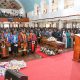 Rev. Scovia Kumakech (Right), University Leadership, Family and Friends join in song during Prof. Livingstone Luboobi's emotional send-off on 18th July 2025. Funeral service in honour of Professor Livingstone Sserwadda Luboobi, 18th July 2025, St. Francis Chapel, Makerere University, Kampala Uganda, East Africa.