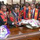 The Vice Chancellor alongside other university officials laying a wreath on Prof. Luboobi's Casket at St. Francis Chapel, Makerere