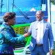 The Vice Chancellor, Prof. Barnabas Nawangwe (Right) handing over keys of branded buses to Prof. Gorettie N. Nabanoga the Principal College of Agricultural and Environmental Science
