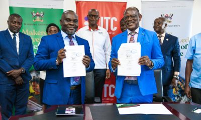 Prof. Barnabas Nawangwe, the Vice Chancellor and Mr. Saul Seremba, the Executive Director of the Insurance Training College show off the signed MoU