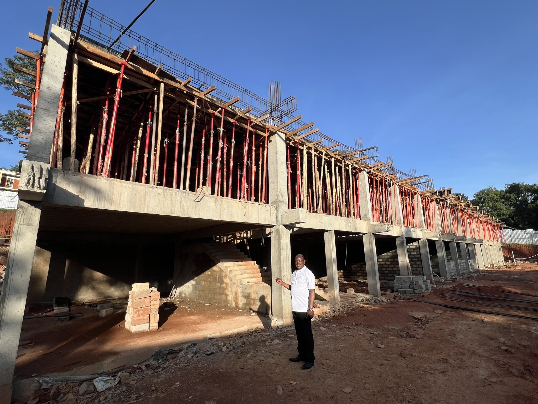 The Vice Chancellor, Prof. Nawangwe inspecting ongoing works of the construction of a new building donated by Tororo Cement