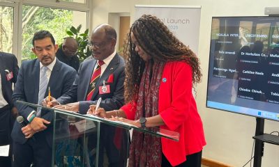 Second right Vice Chancellor, Prof. Nawangwe signs the MoU