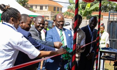 The Vice Chancellor, Prof. Barnabas Nawangwe (Third Left) with otther officials cutting the ribbon to commission M/s REDVERS