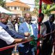 The Vice Chancellor, Prof. Barnabas Nawangwe (Third Left) with otther officials cutting the ribbon to commission M/s REDVERS