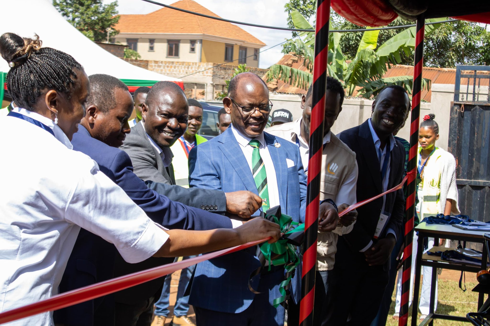 The Vice Chancellor, Prof. Barnabas Nawangwe (Third Left) with otther officials cutting the ribbon to commission M/s REDVERS
