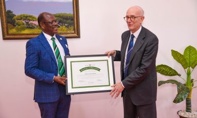 The Vice Chancellor, Prof. Barnabas Nawangwe handing over the Certificate of Appreciation to Ambassador Mauro Massoni of Italy